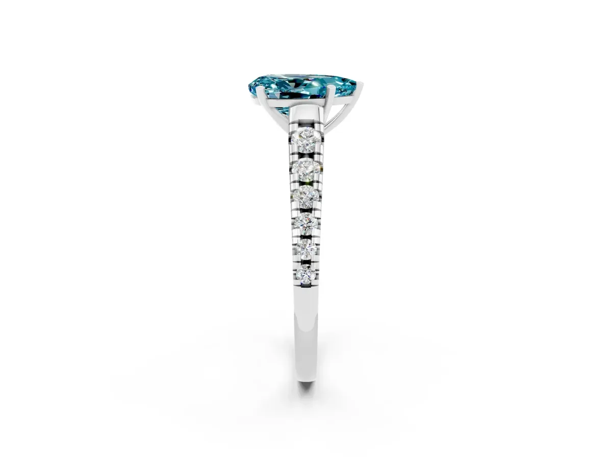 Pear Cut Blue Topaz Cathedral Solitaire Ring with Round Pavé Band Silver