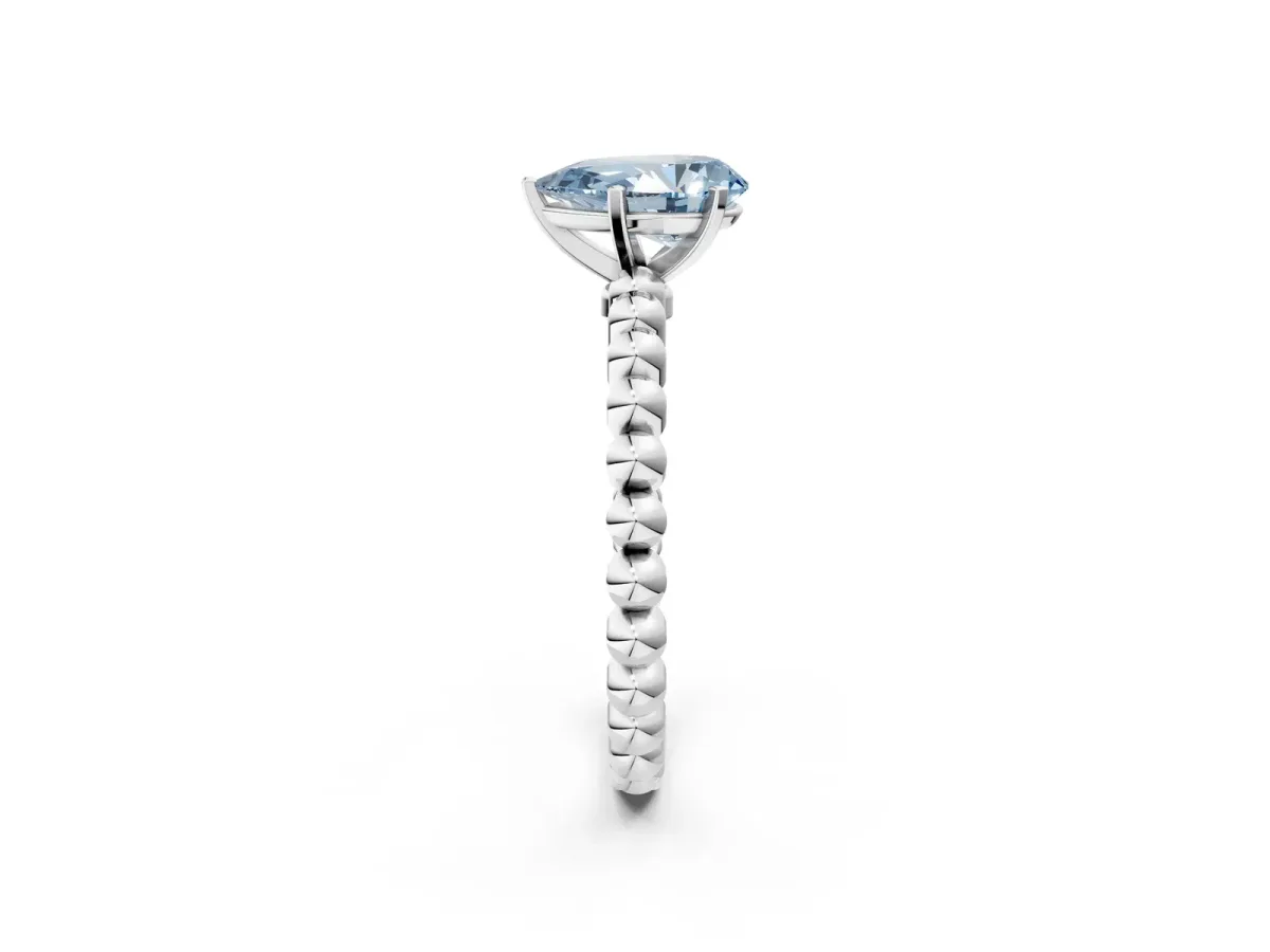 Fancy Blue Pear Cut Diamond Solitaire Ring with Beaded Band and Prong Setting Silver