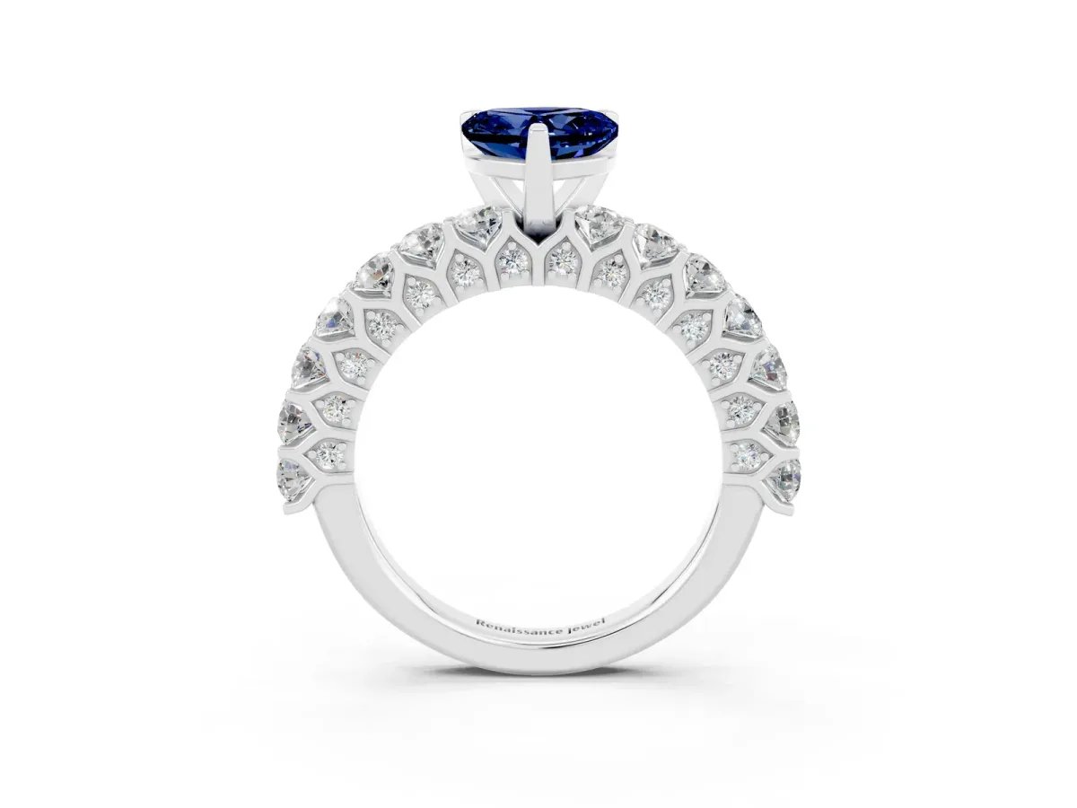 Heart Cut Blue Sapphire Solitaire Ring with Shared Prong Pavé Band and Four-Prong Setting Silver