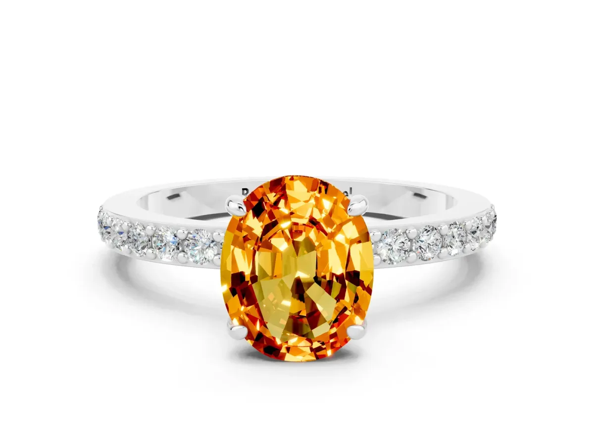 Oval Cut Citrine Solitaire Engagement Ring with Pavé Band and Four-Prong Setting Silver
