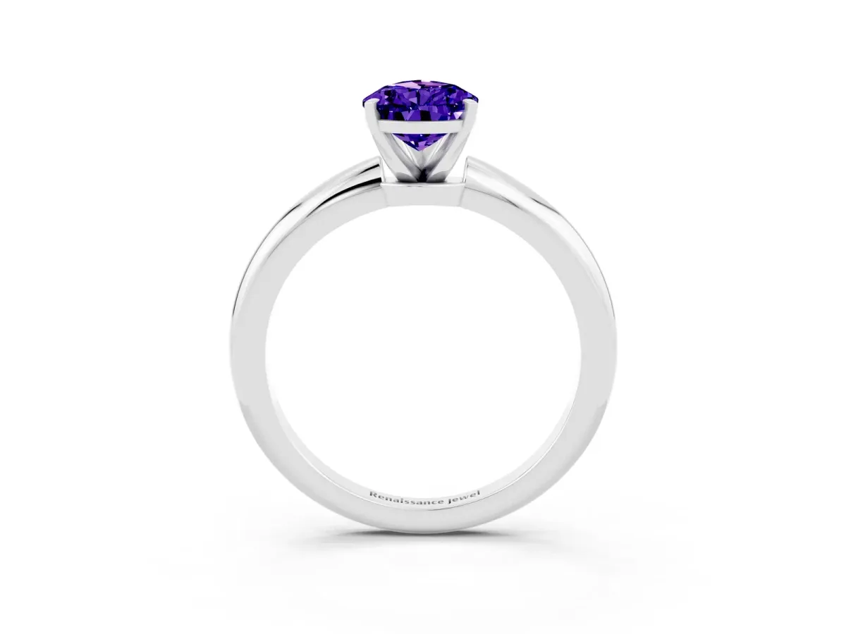 Pear Cut Tanzanite Solitaire Ring with Six-Prong Setting and Classic Band Silver