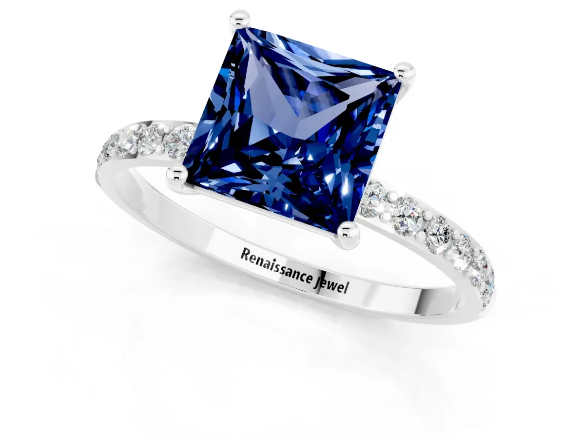 Princess Cut Blue Sapphire Solitaire Ring with Round Pavé Band and Prong Setting Silver