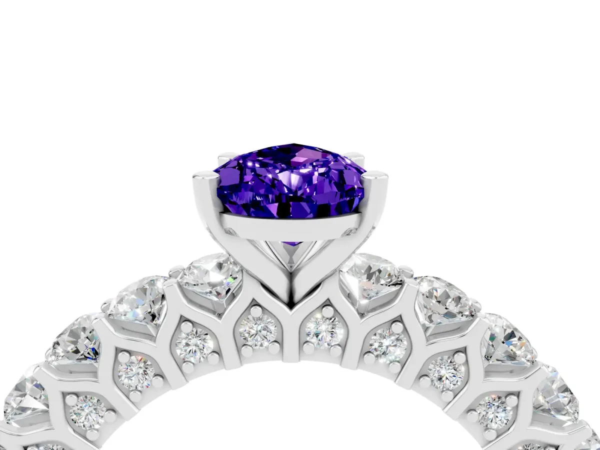 Pear Cut Tanzanite Solitaire Ring with Shared Prong Pavé Band and Four-Prong Setting Silver