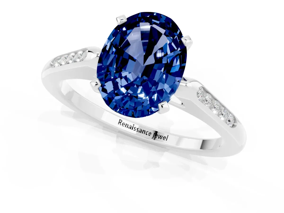 Oval Cut Blue Sapphire Solitaire Ring with Channel Set Round Band and Prong Setting Silver