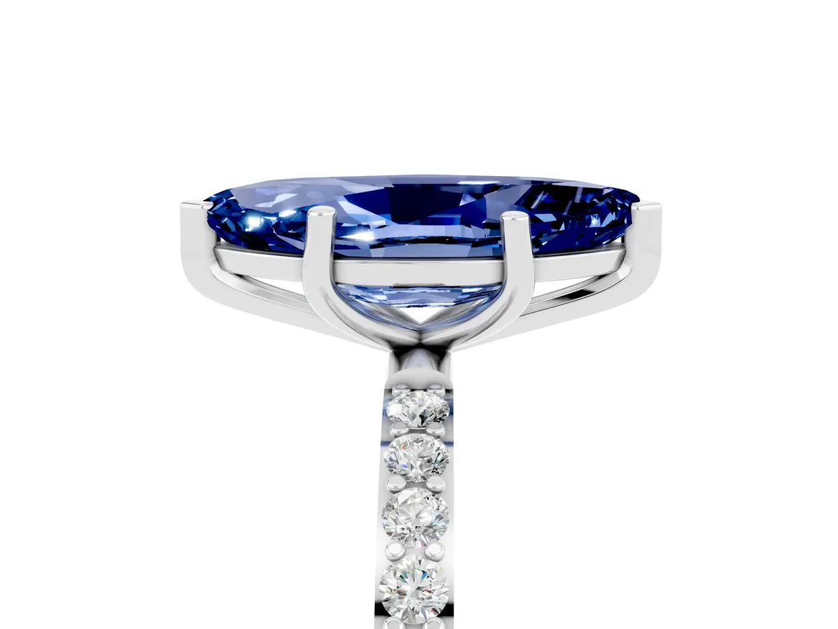 Marquise Cut Blue Sapphire Solitaire Ring with Round Pavé Band and Prong Setting Silver