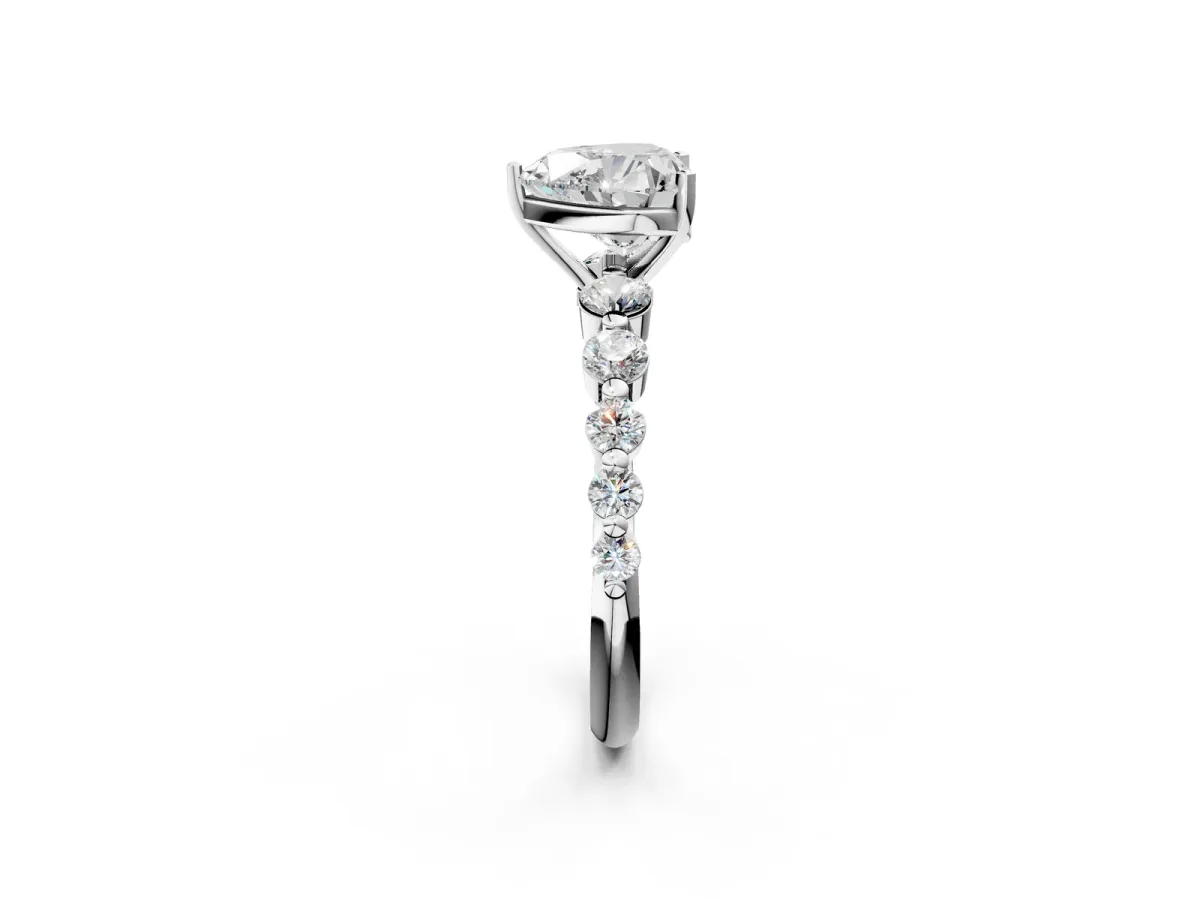 Heart Cut Solitaire Diamond Ring with Pave Band and Four-Prong Setting Silver