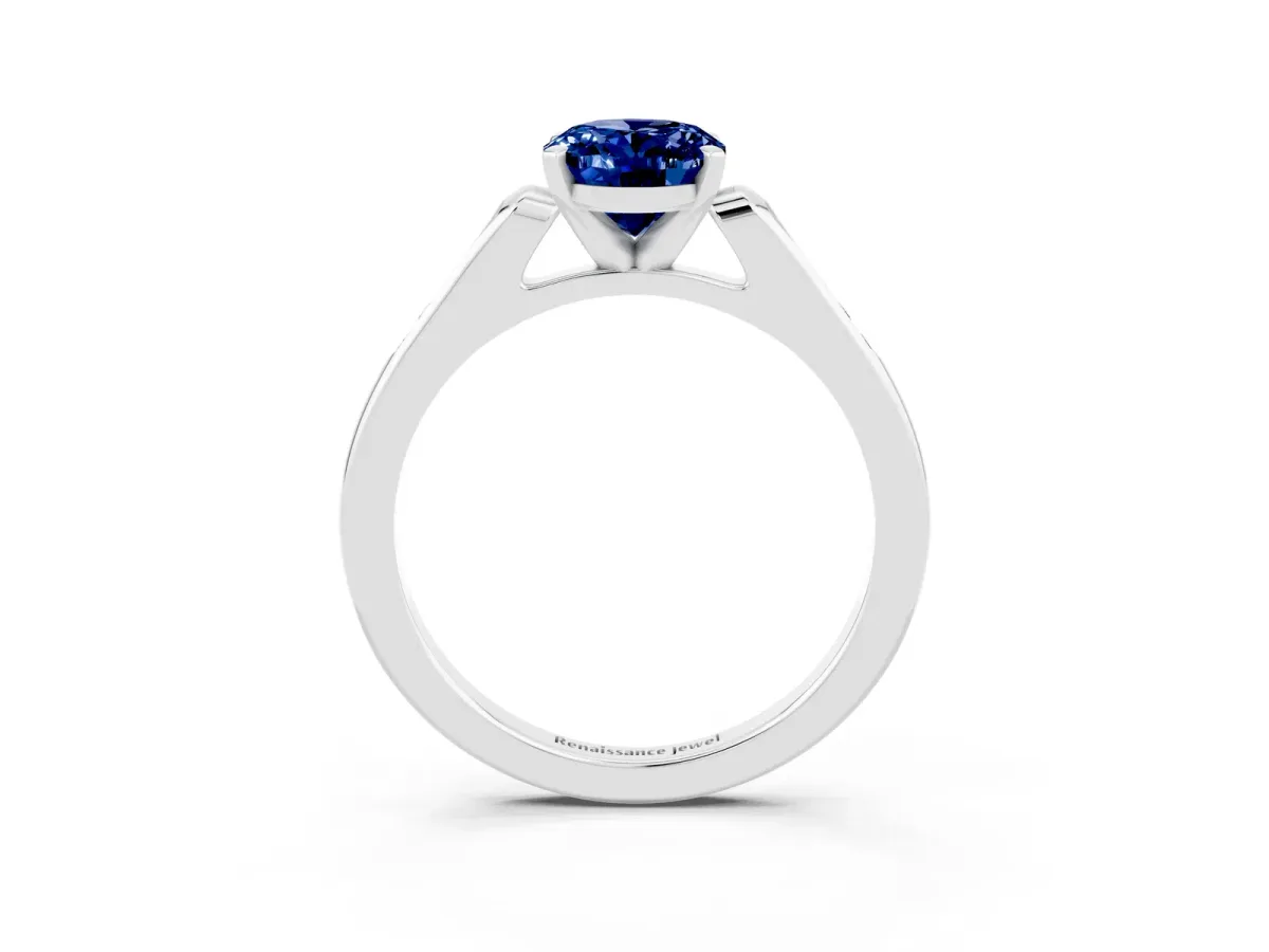 Oval Cut Blue Sapphire Solitaire Ring with Channel Set Round Band and Prong Setting Silver
