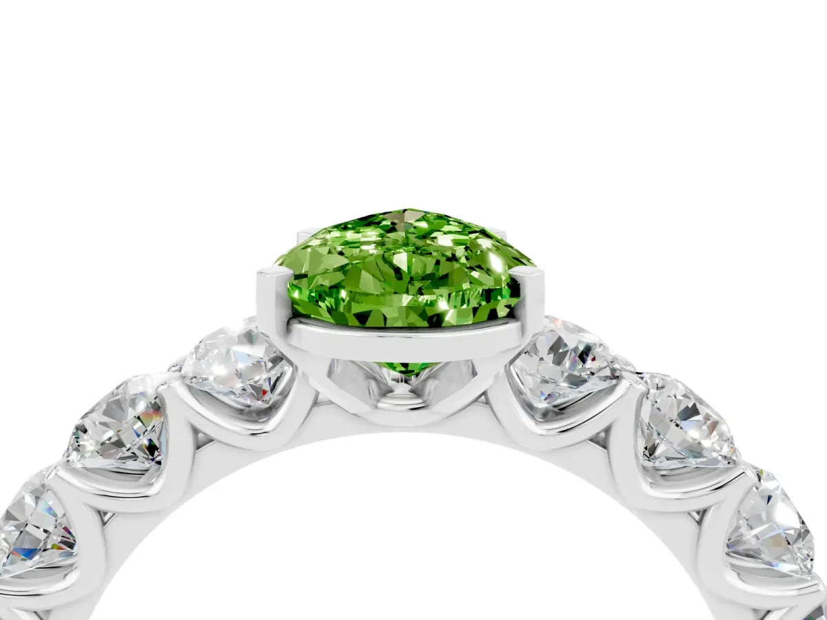 Pear Cut Peridot Prong Setting with Side Stones on a Pave Band Silver