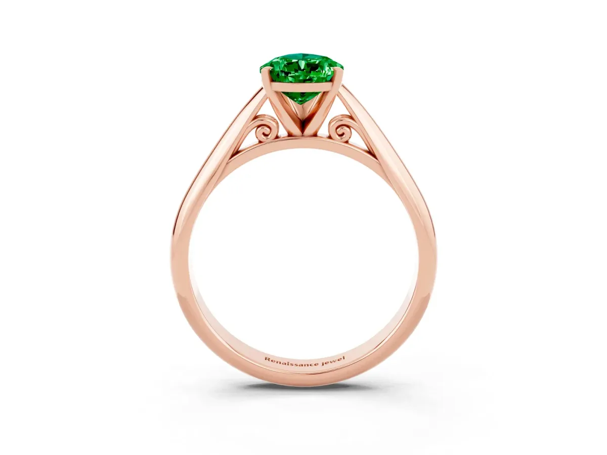 Pear Cut Emerald Solitaire Engagement Ring with Cathedral Setting and Four-Prong Mount Rose gold