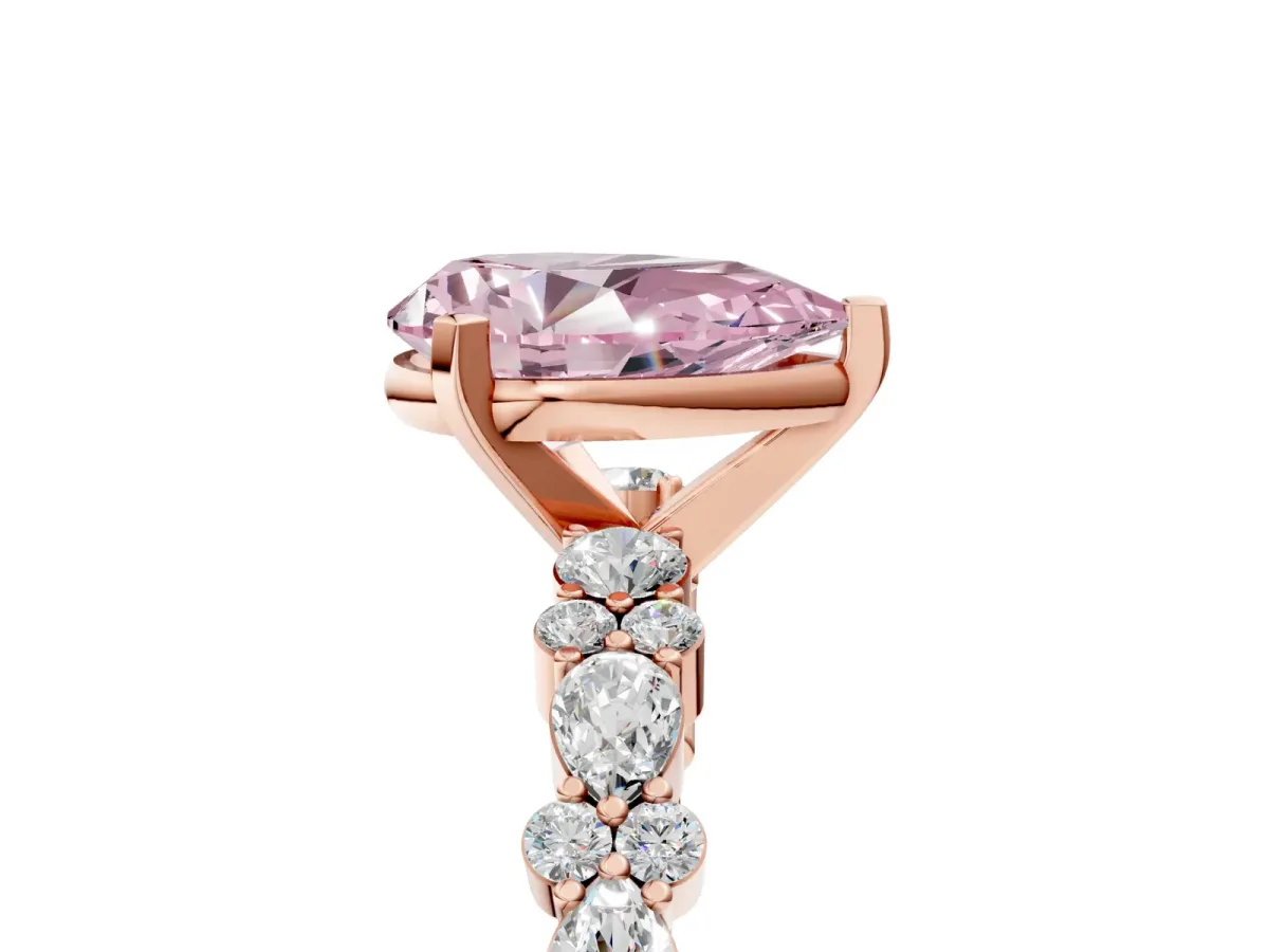Fancy Pink Pear Cut Diamond Side Stone Solitaire Ring with Round and Four-Prong Setting Rose gold