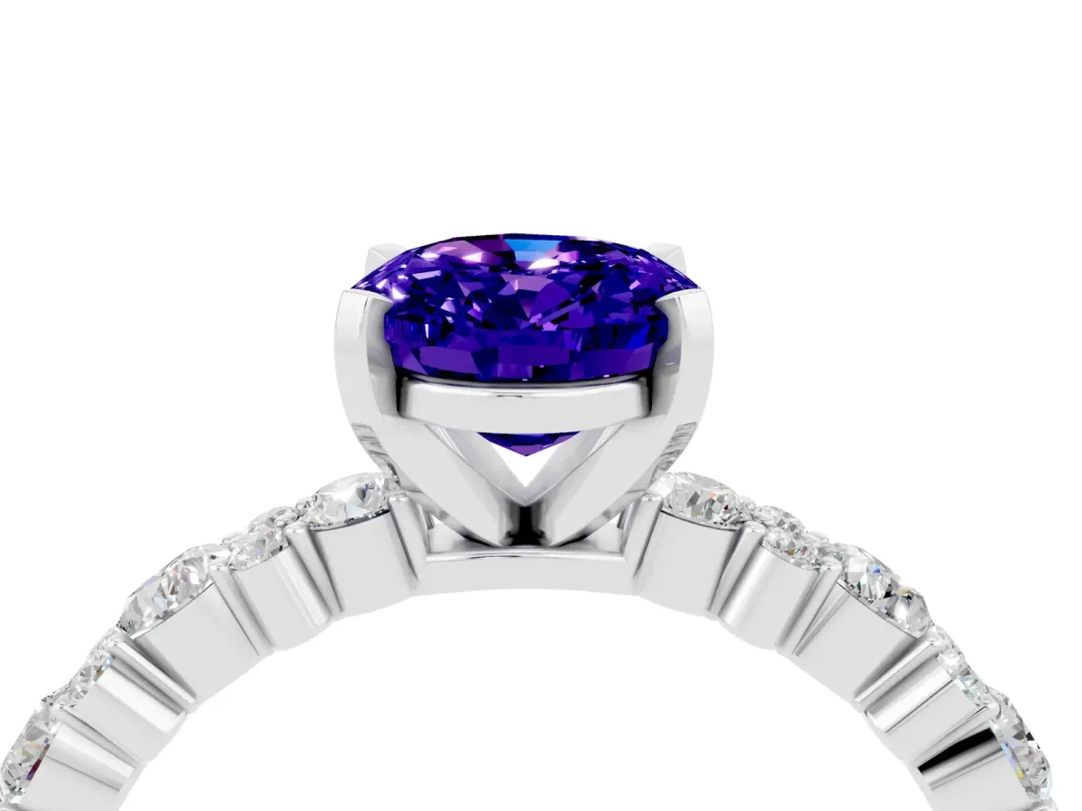 Oval Cut Tanzanite Side Stone Solitaire Ring with Round and Four-Prong Setting White gold
