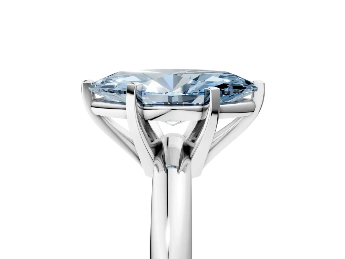 Fancy Blue Marquise Cut Diamond Solitaire Engagement Ring with Round Band and Four-Prong Setting Silver