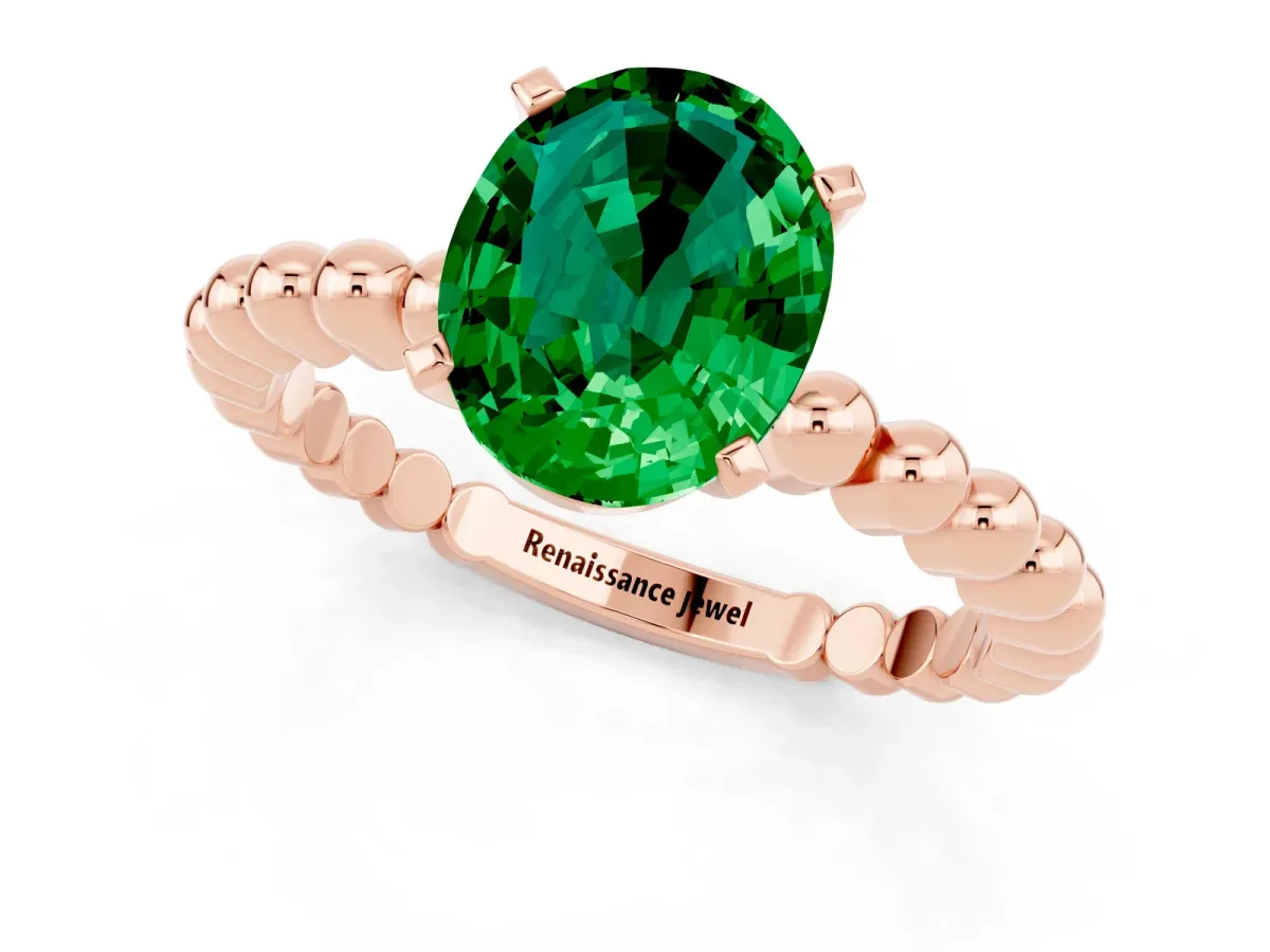 Oval Cut Emerald Solitaire Ring with Beaded Band and Prong Setting Rose gold