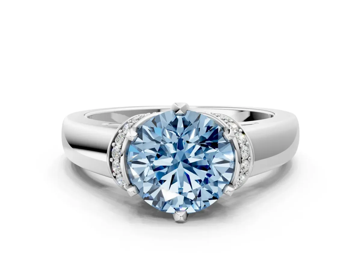 Fancy Blue Round Cut Solitaire Diamond Ring with Pave Band and Six-Prong Setting Silver
