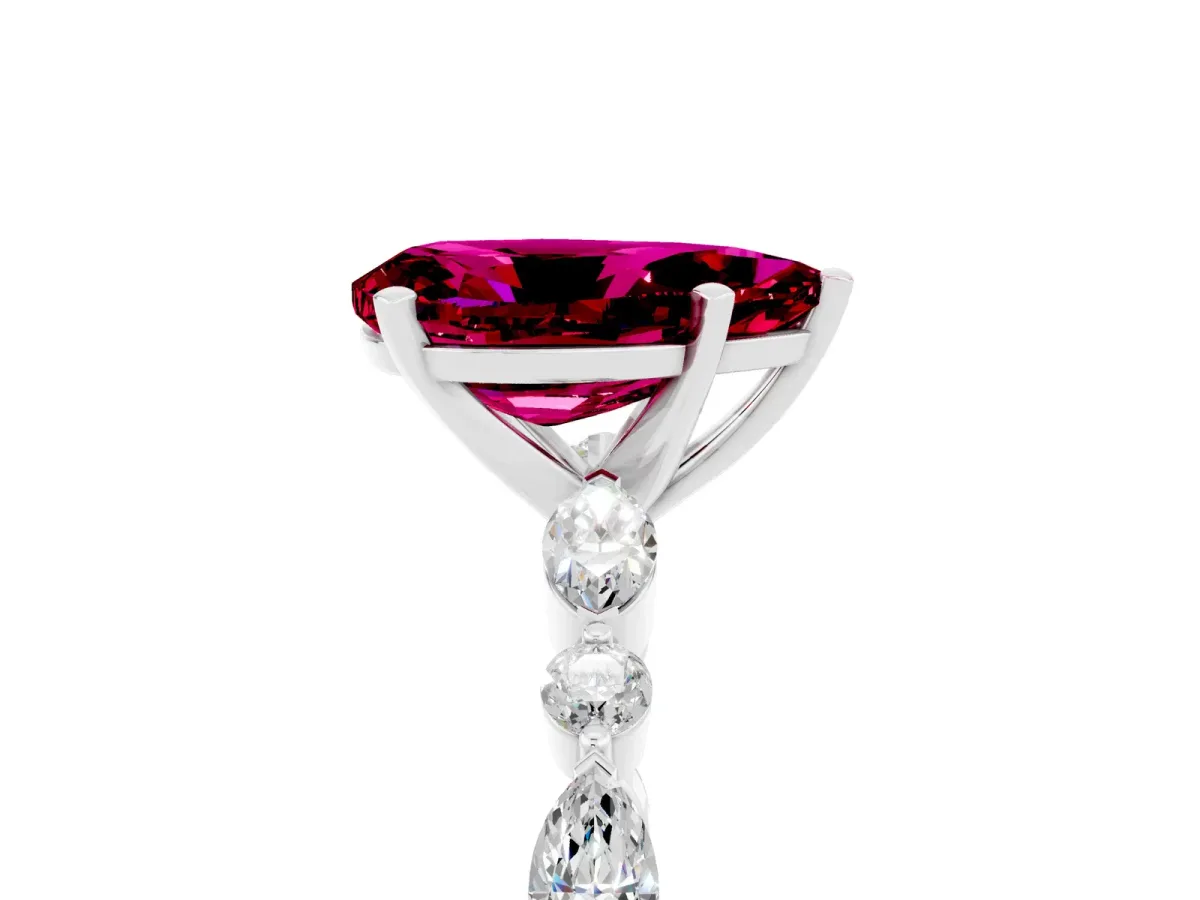 Pear Cut Garnet Ring with Marquise and Round Side Stones and Four-Prong Setting Silver