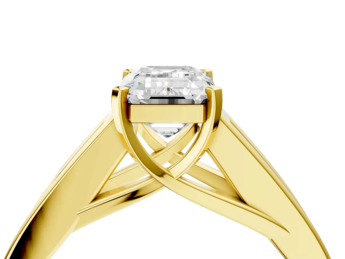 Emerald Cut Cut Channel Set Solitaire Ring with Four-Prong Setting Yellow gold