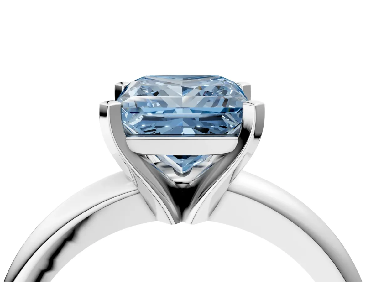 Fancy Blue Princess Cut Diamond Solitaire Engagement Ring with Round Band and Four-Prong Setting Silver