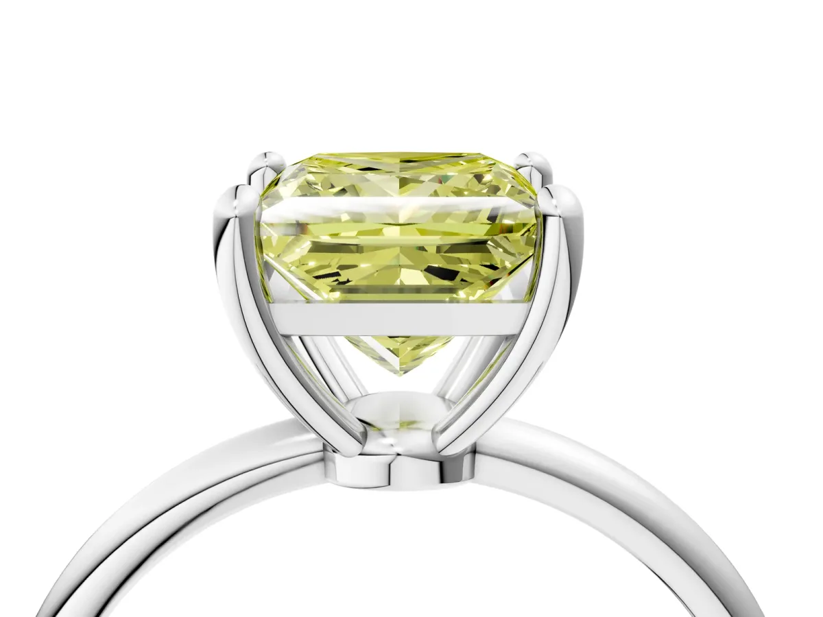Fancy Yellow Princess Cut Solitaire Diamond Ring with 4-Prong Setting on a Classic Band Silver