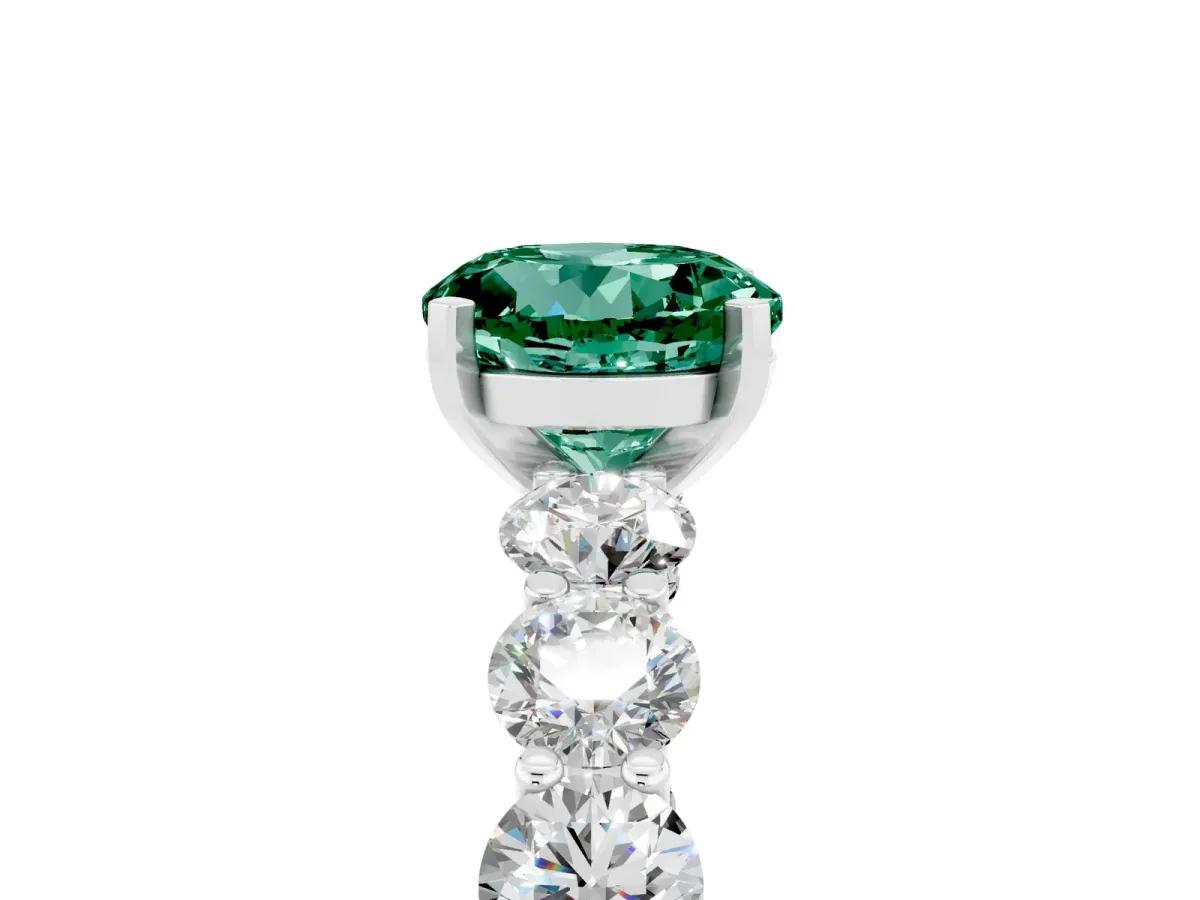 Round Cut Green Sapphire Prong Setting with Side Stones on a Pave Band Silver