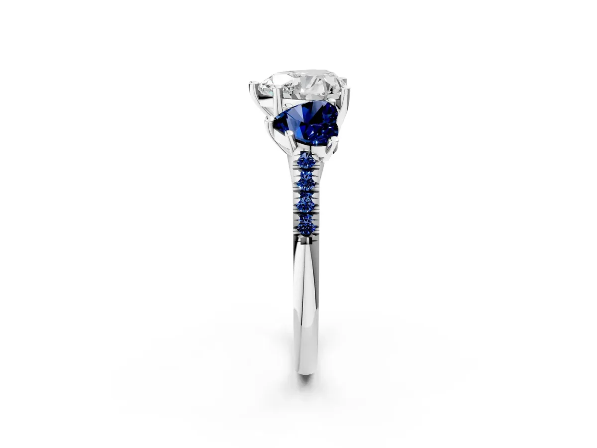 Three-Stone Heart Cut Diamond Ring with Round Blue Sapphire Pavé Band and Prong Setting Silver