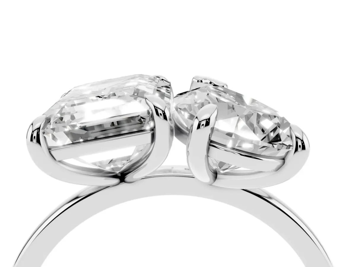 Pear and Emerald Toi Moi Ring with Prong Setting and Plain Band Platinum