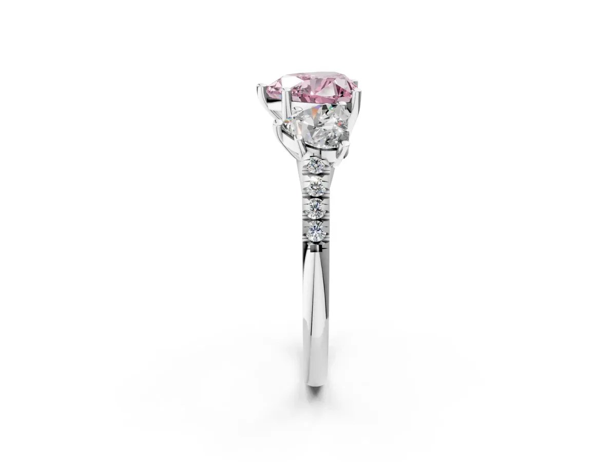 Fancy Pink Three-Stone Heart Cut Diamond Ring with Round Pavé Band and Prong Setting Silver
