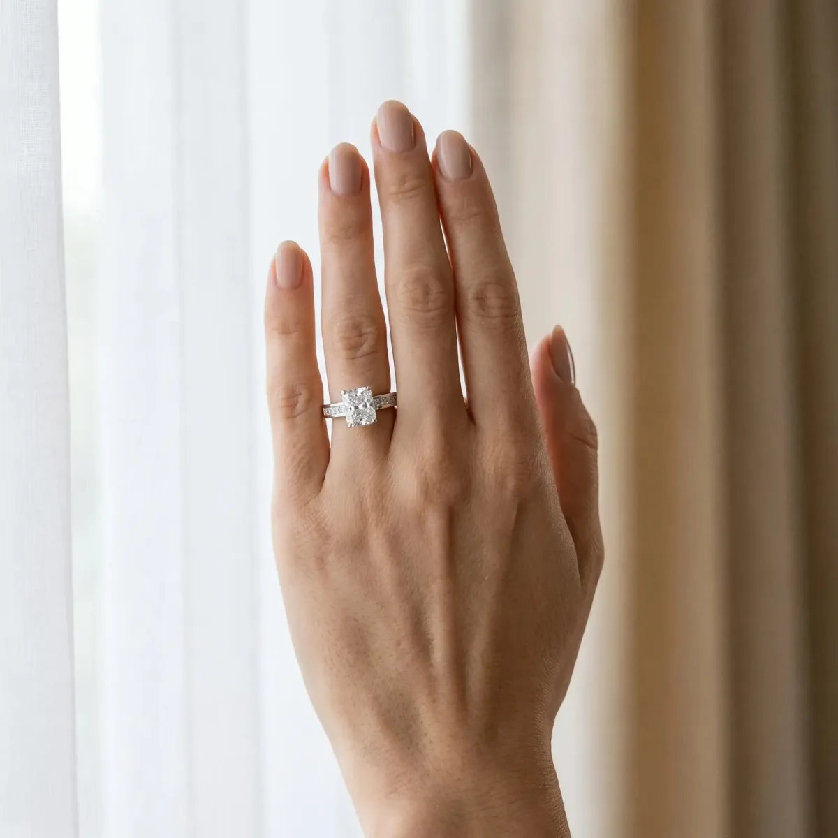 Radiant Cut Solitaire Diamond Ring with Channel-Set Band and Four-Prong Setting Platinum