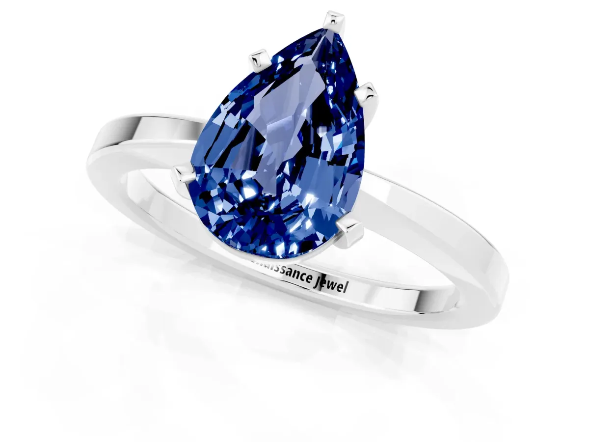 Pear Cut Blue Sapphire Solitaire Engagement Ring with Classic Band and Four-Prong Setting Silver