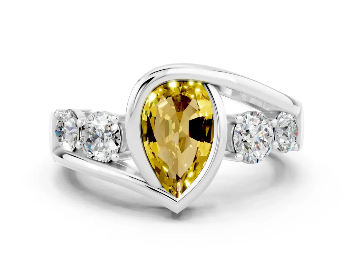 Bezel Set Pear Cut Yellow Sapphire Bypass Ring with Round Accents Silver