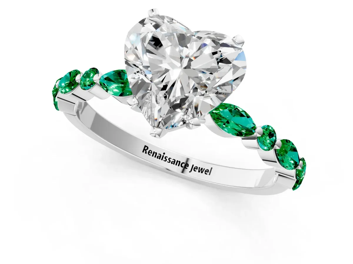 Heart Cut Diamond Ring with Marquise and Round Emerald Side Stones and Four-Prong Setting Silver