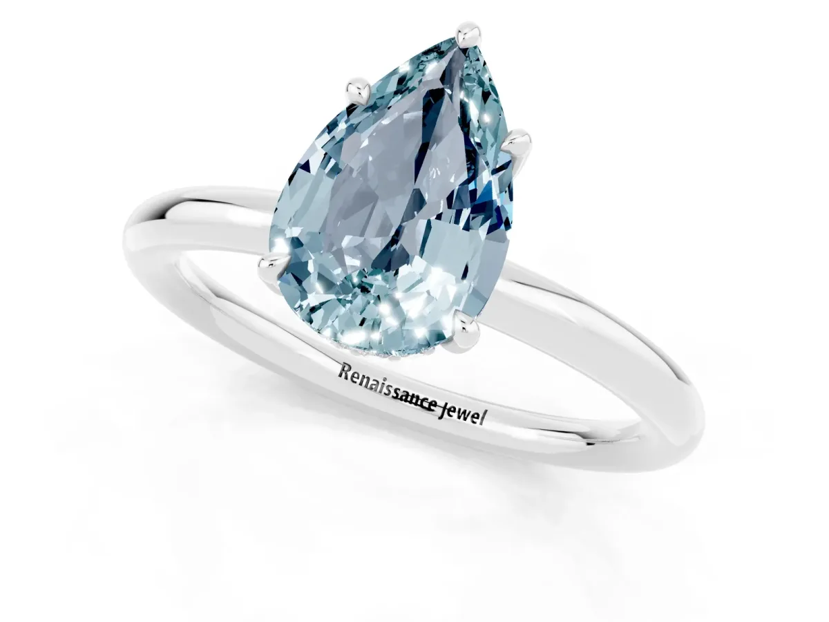 Pear Cut Aquamarine Solitaire Ring with Thin Band and Four-Prong Setting Silver