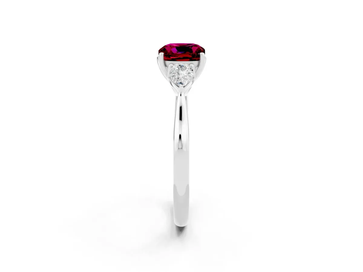 Three-Stone Cushion Cut Garnet Ring with Pear Side Stones in Four-Prong Setting White gold