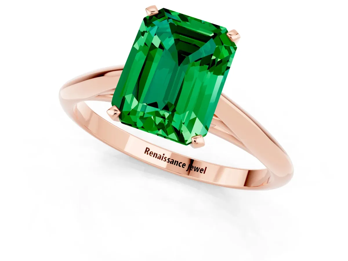Emerald Cut Emerald Solitaire Engagement Ring with Cathedral Setting and Four-Prong Mount Rose gold