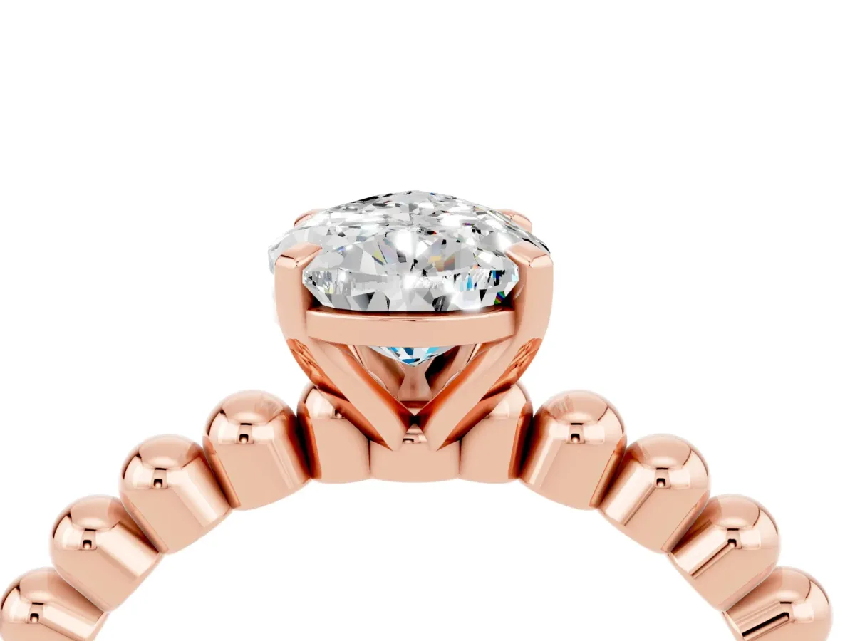Pear Cut Moissanite Solitaire Ring with Beaded Band and Prong Setting Rose gold