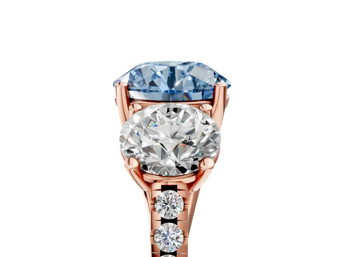Fancy Blue Three-Stone Round Cut Diamond Ring with Round Pavé Band and Prong Setting Rose gold