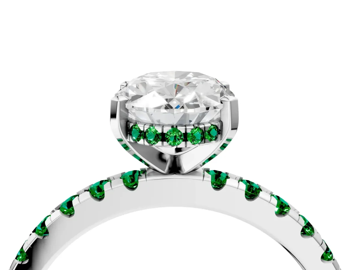 Oval Cut Diamond Solitaire Ring with Round Emerald Pavé Band and Four-Prong Setting Silver
