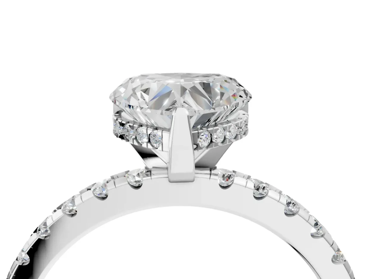 Heart Cut Diamond Solitaire Ring with Round Pavé Band and Four-Prong Setting Silver