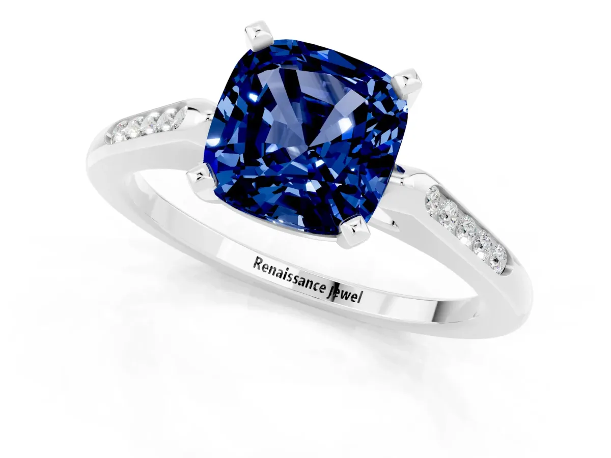 Cushion Cut Blue Sapphire Solitaire Ring with Channel Set Round Band and Prong Setting Silver
