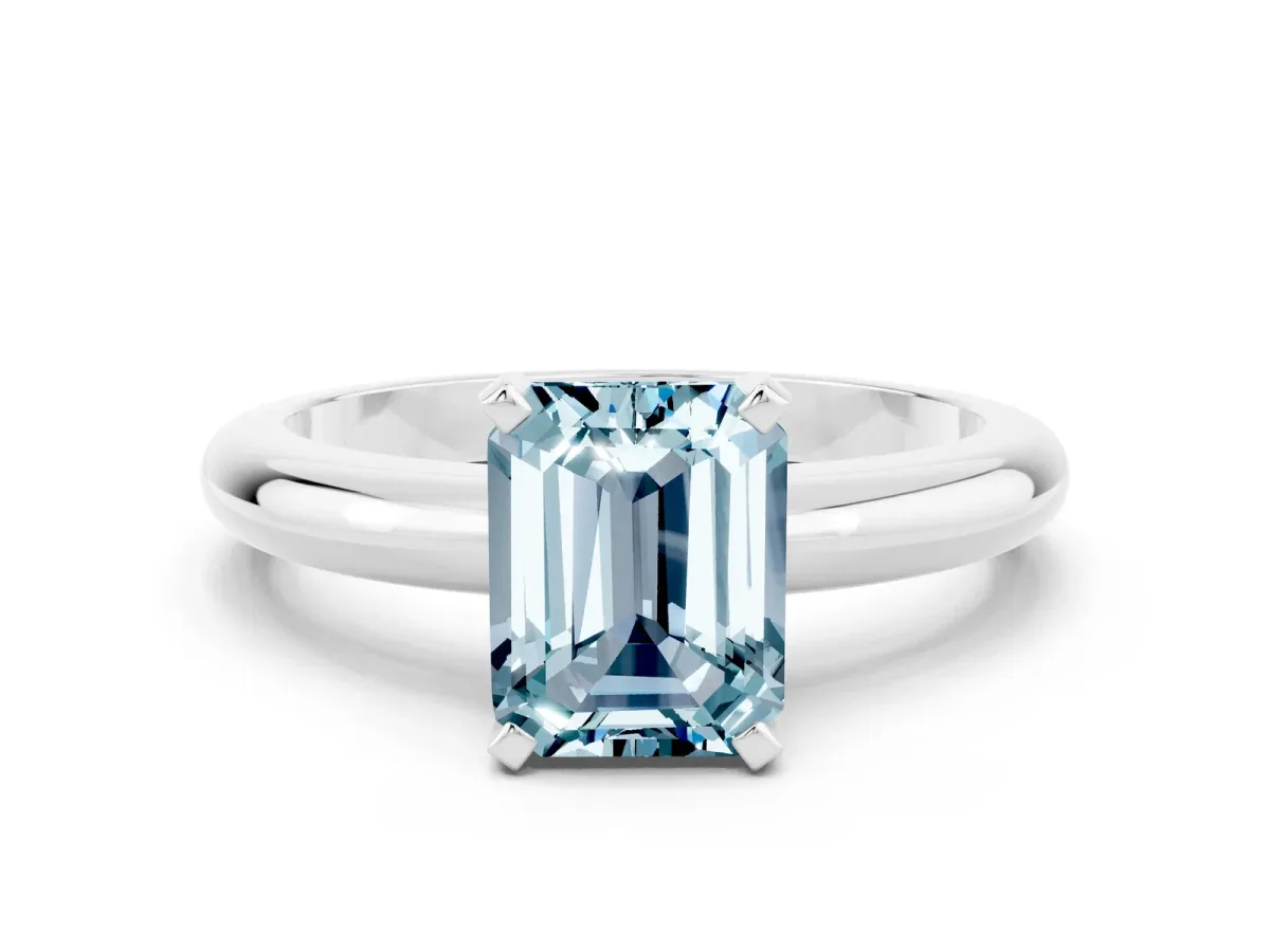 Emerald Cut Aquamarine Solitaire Engagement Ring with Round Band and Four-Prong Setting Silver