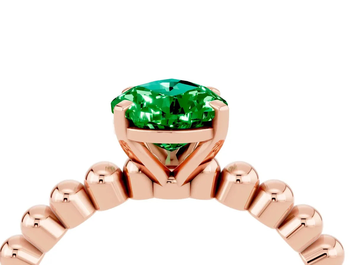 Pear Cut Emerald Solitaire Ring with Beaded Band and Prong Setting Rose gold