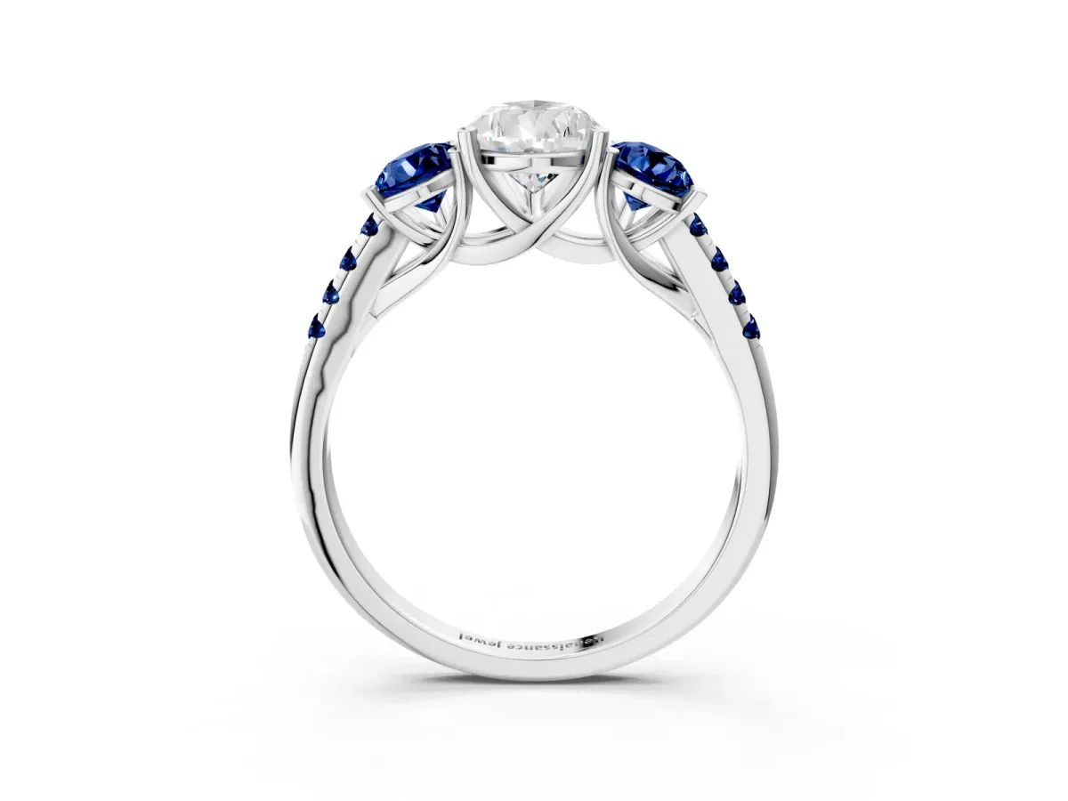 Three-Stone Pear Cut Diamond Ring with Round Blue Sapphire Pavé Band and Prong Setting Silver