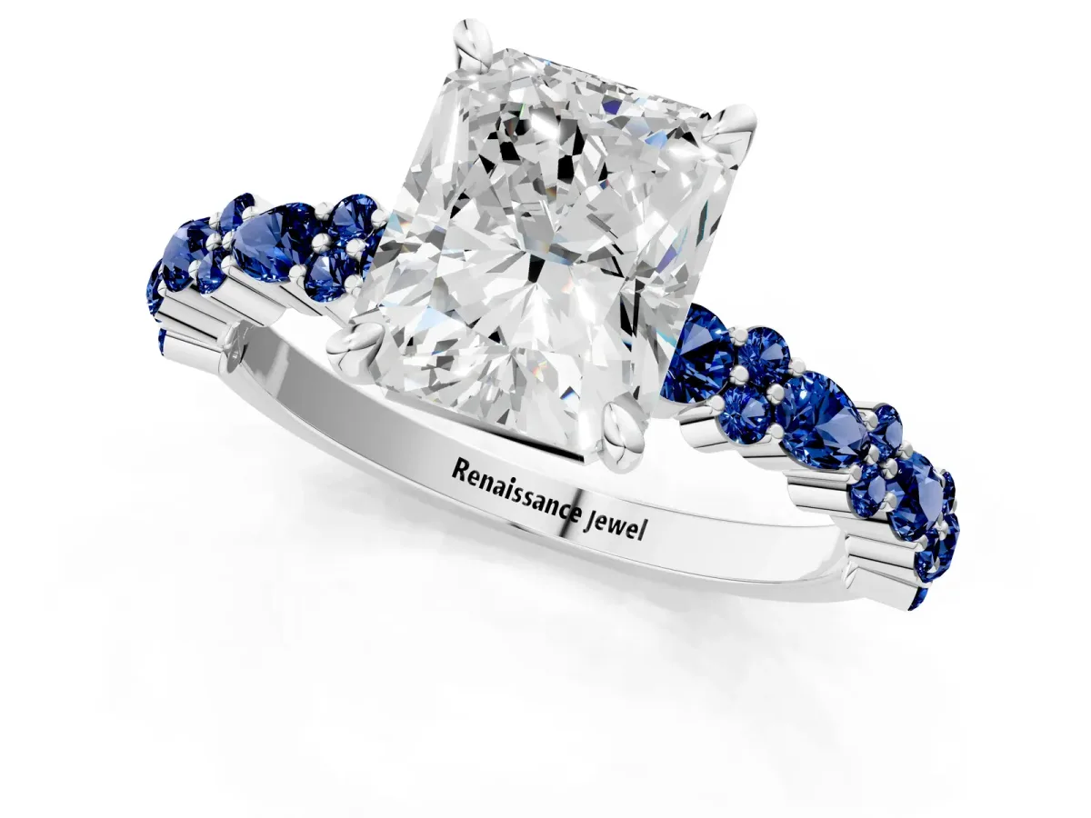 Radiant Cut Diamond Side Stone Solitaire Ring with Round Blue Sapphire and Four-Prong Setting Platinum