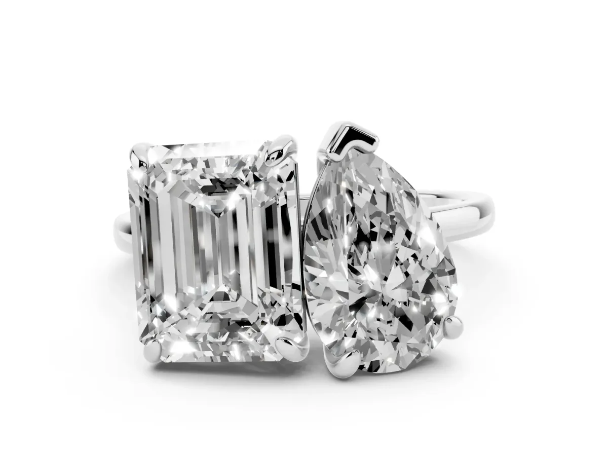 Pear and Emerald Toi Moi Ring with Prong Setting and Plain Band Platinum