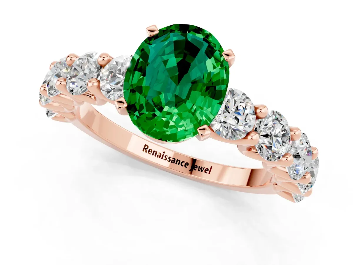 Oval Cut Emerald Prong Setting with Side Stones on a Pave Band Rose gold