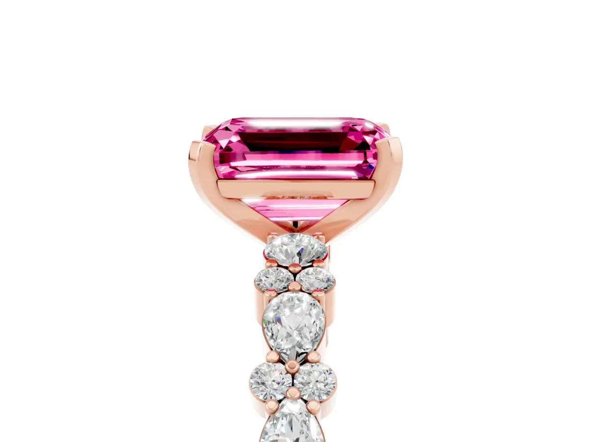 Emerald Cut Pink Sapphire Side Stone Solitaire Ring with Round and Four-Prong Setting Rose gold