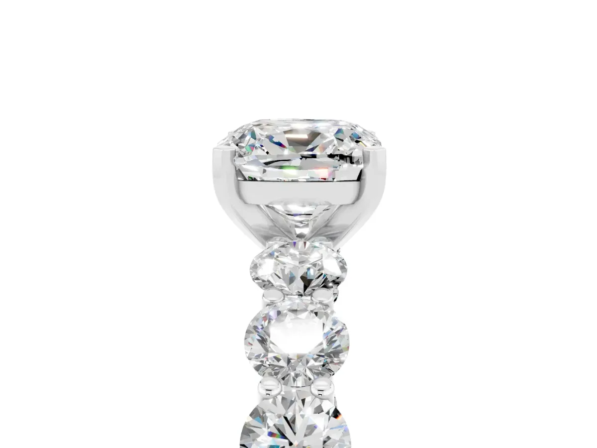 Cushion Cut Moissanite Prong Setting with Side Stones on a Pave Band Silver