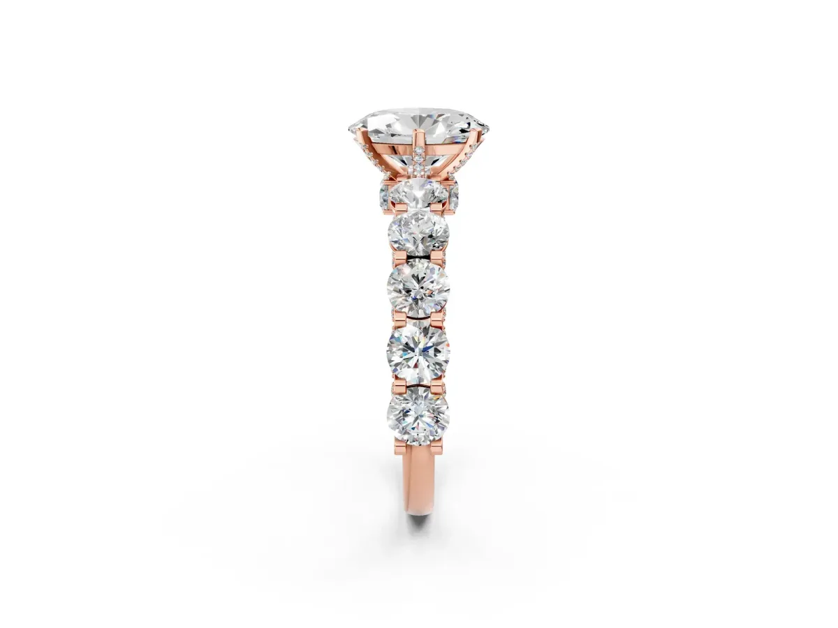 Oval Cut Diamond Side Stone Engagement Ring with Four-Prong Setting Rose gold