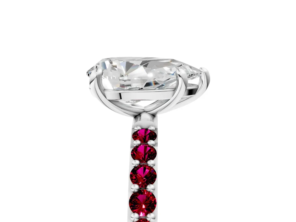 Pear Cut Diamond Solitaire Ring with Round Garnet Pavé Band and Prong Setting Silver