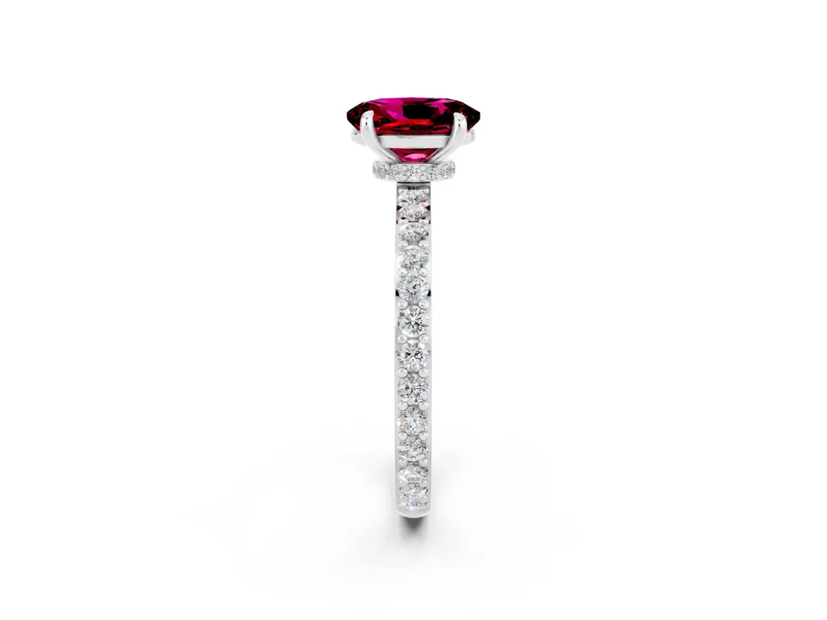 Oval Cut Garnet Solitaire Engagement Ring with Pavé Band and Four-Prong Setting Silver