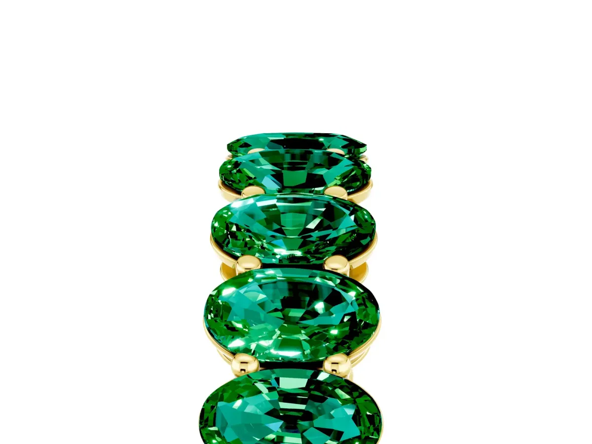 Oval Cut Emerald Eternity Band with Shared Prong Setting Yellow gold